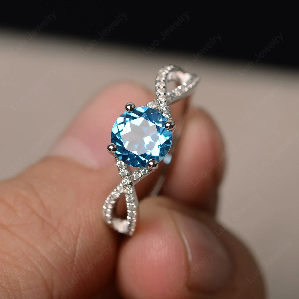 Round Swiss Blue Topaz Twisted Engagement Ring