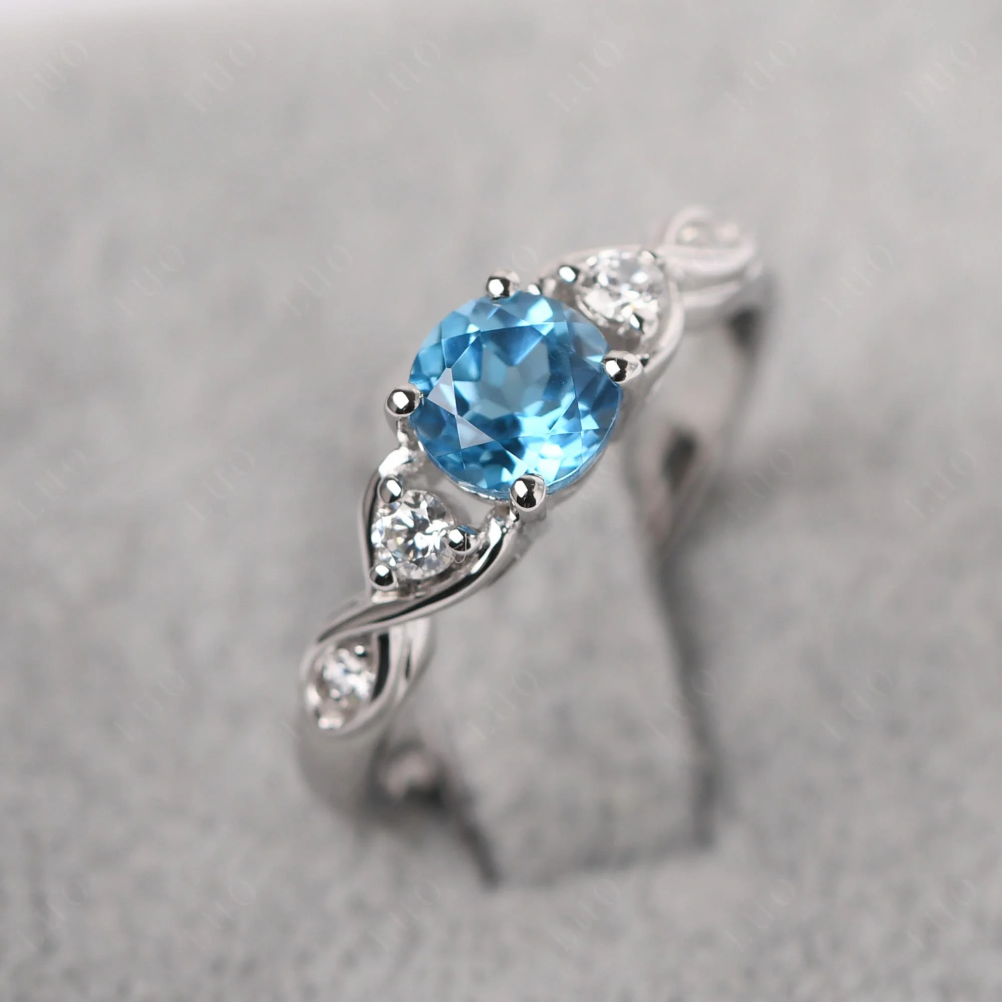 Swiss Blue Topaz Twisted Ring - Image 30
