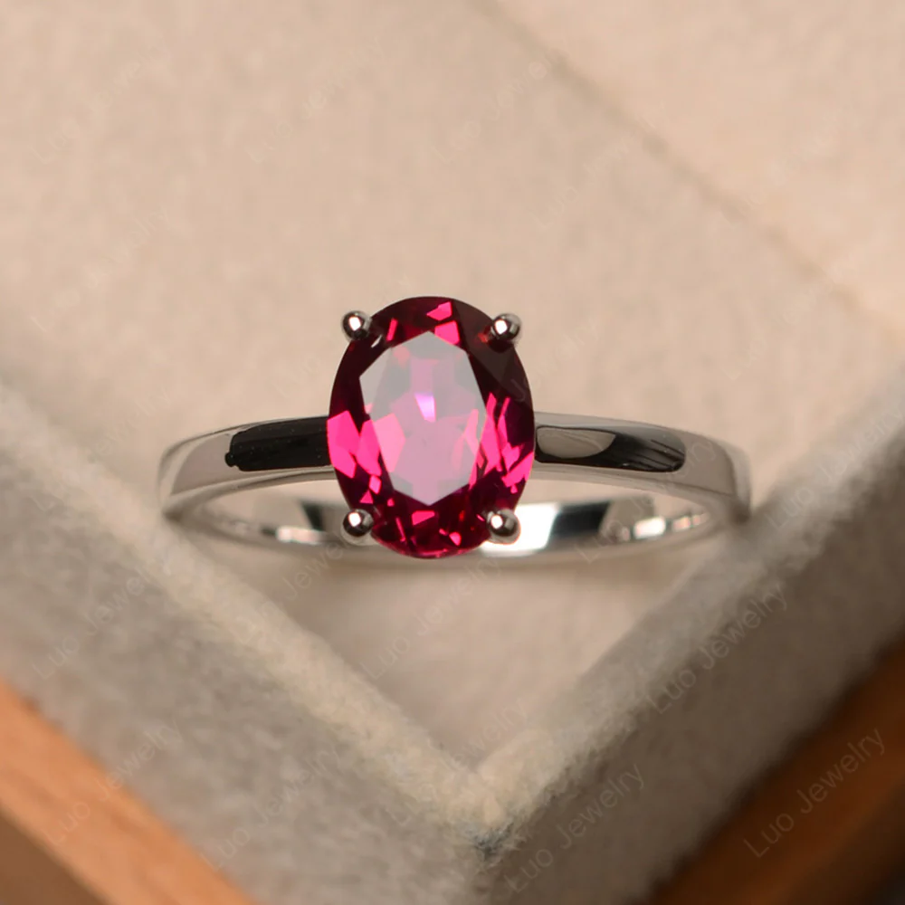 Oval Ruby Solitaire Engagement Ring