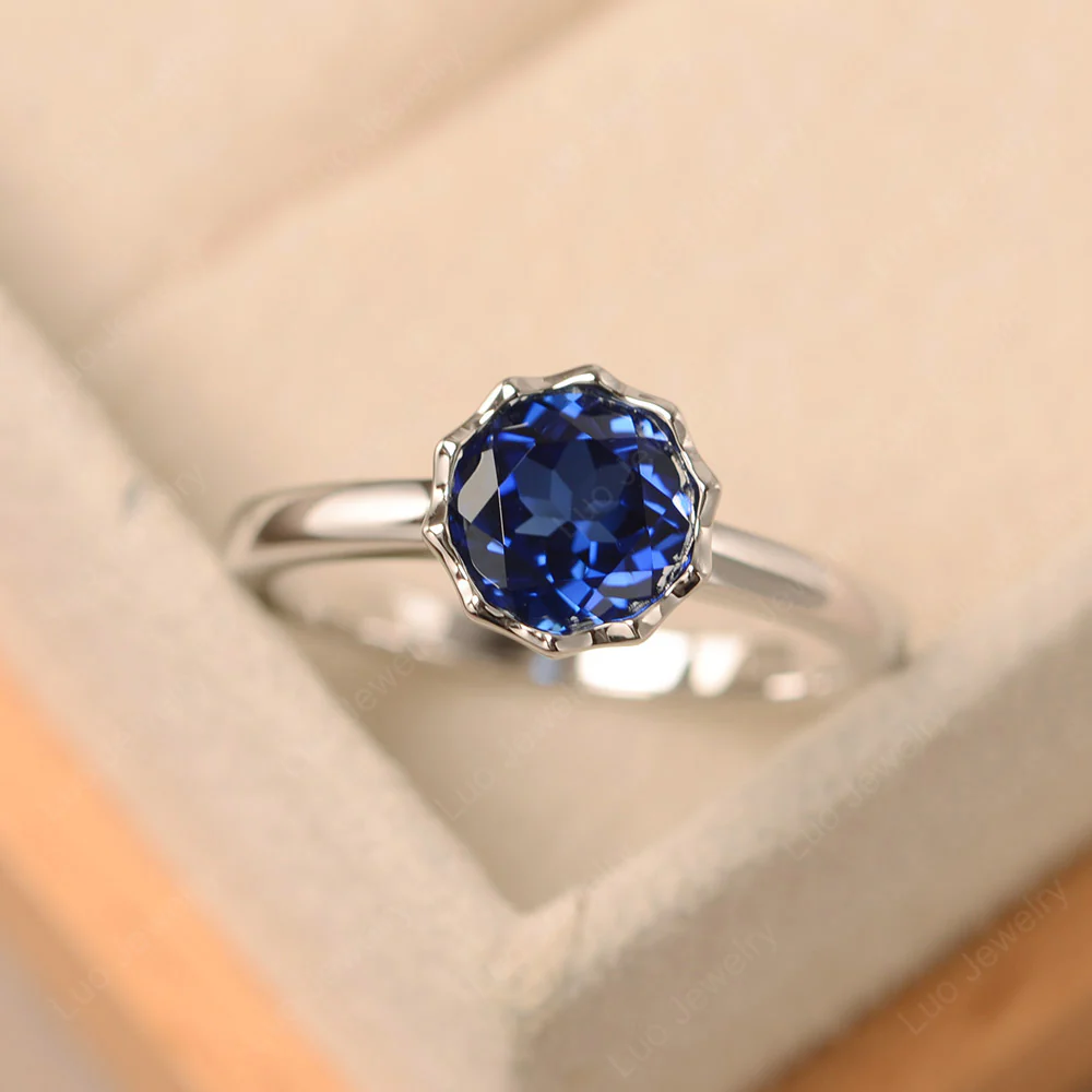 Sapphire Bezel Solitaire Decagon Ring
