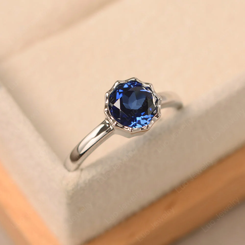 Sapphire Bezel Solitaire Decagon Ring - Image 2