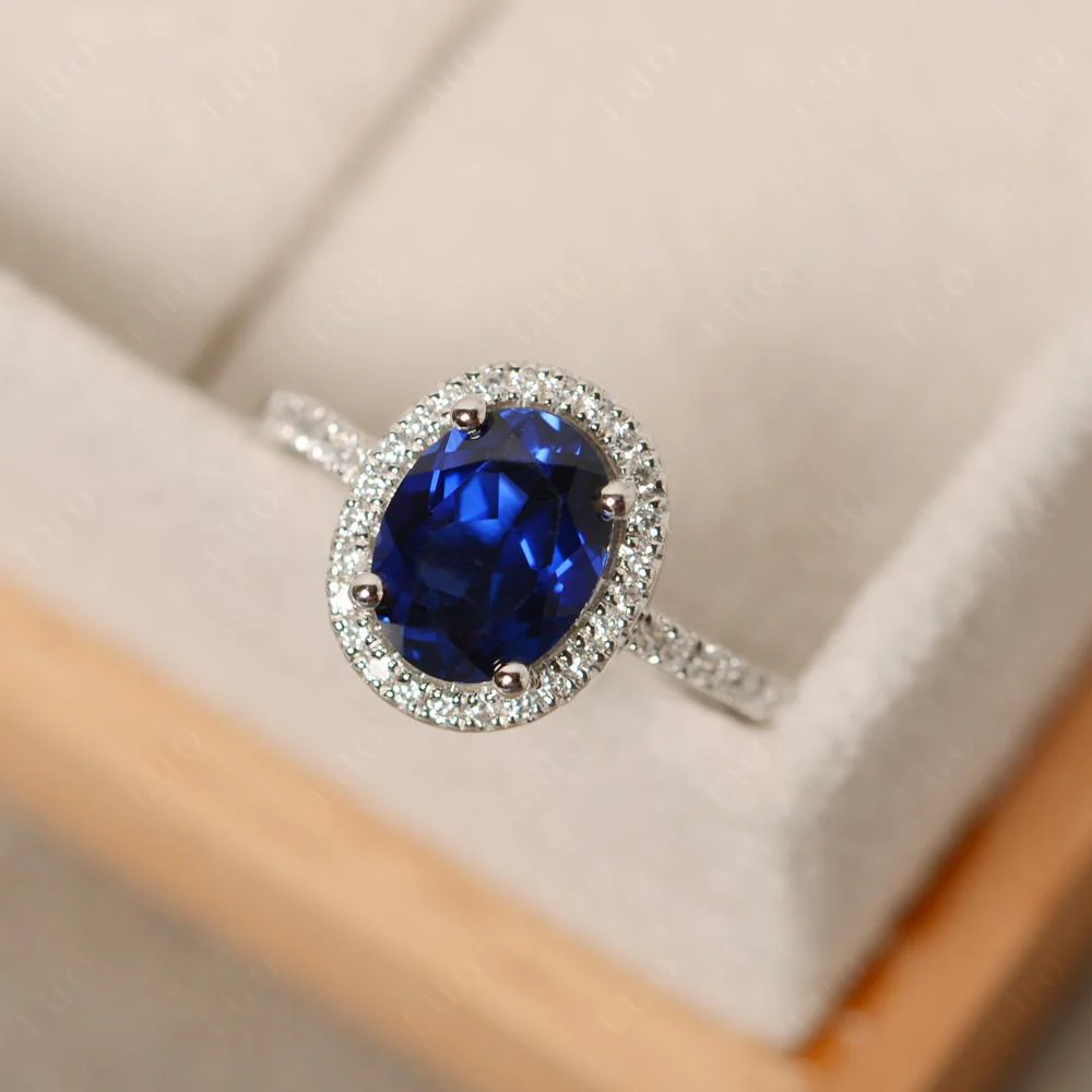 Oval Sapphire Halo Ring - Image 29