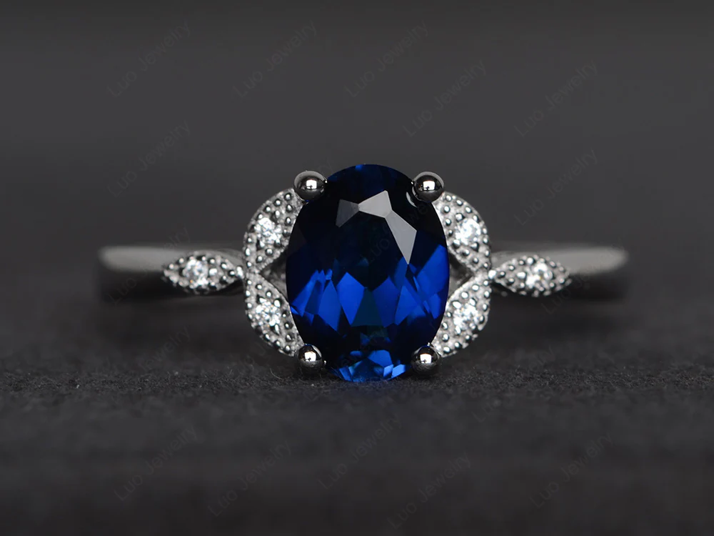 Oval Sapphire Leaf Engagement Ring