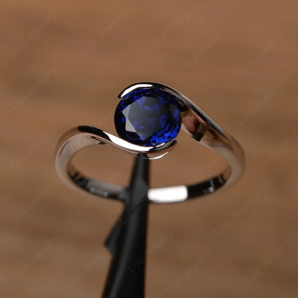 Sapphire Bypass Solitaire Ring