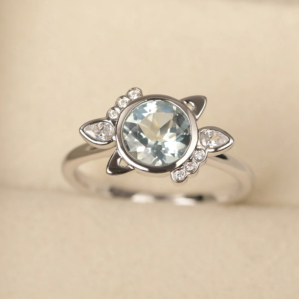 Saturn Style Aquamarine Engagement Ring