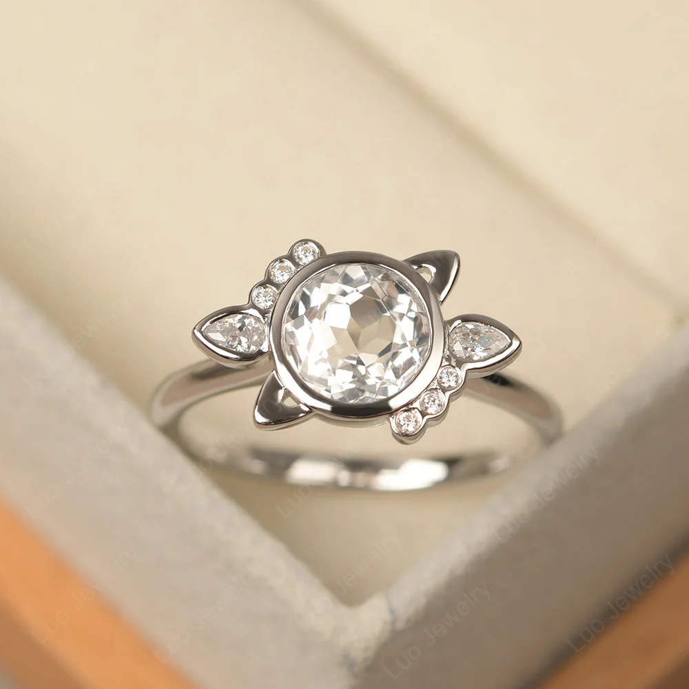 Saturn Style White Topaz Engagement Ring