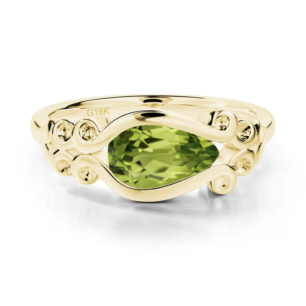 Pear Shaped Peridot Scroll Ring