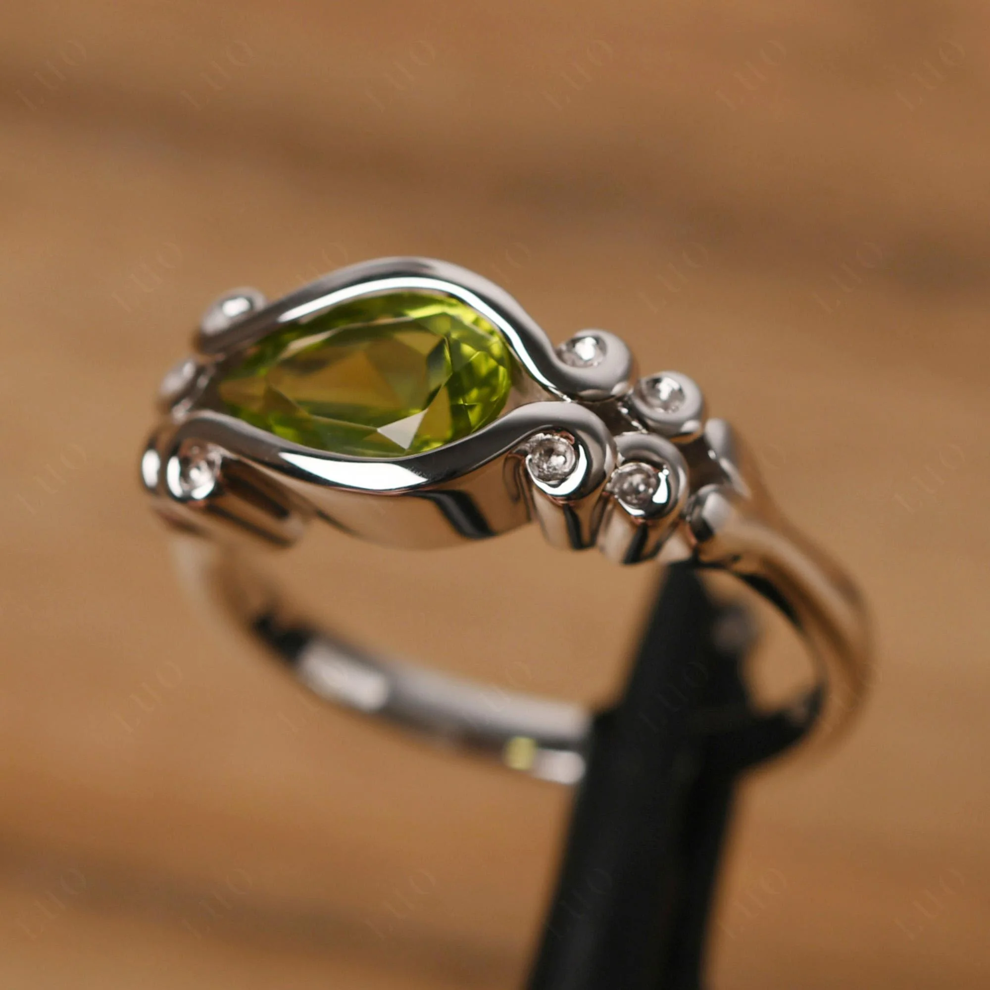Pear Shaped Peridot Scroll Ring - Image 15
