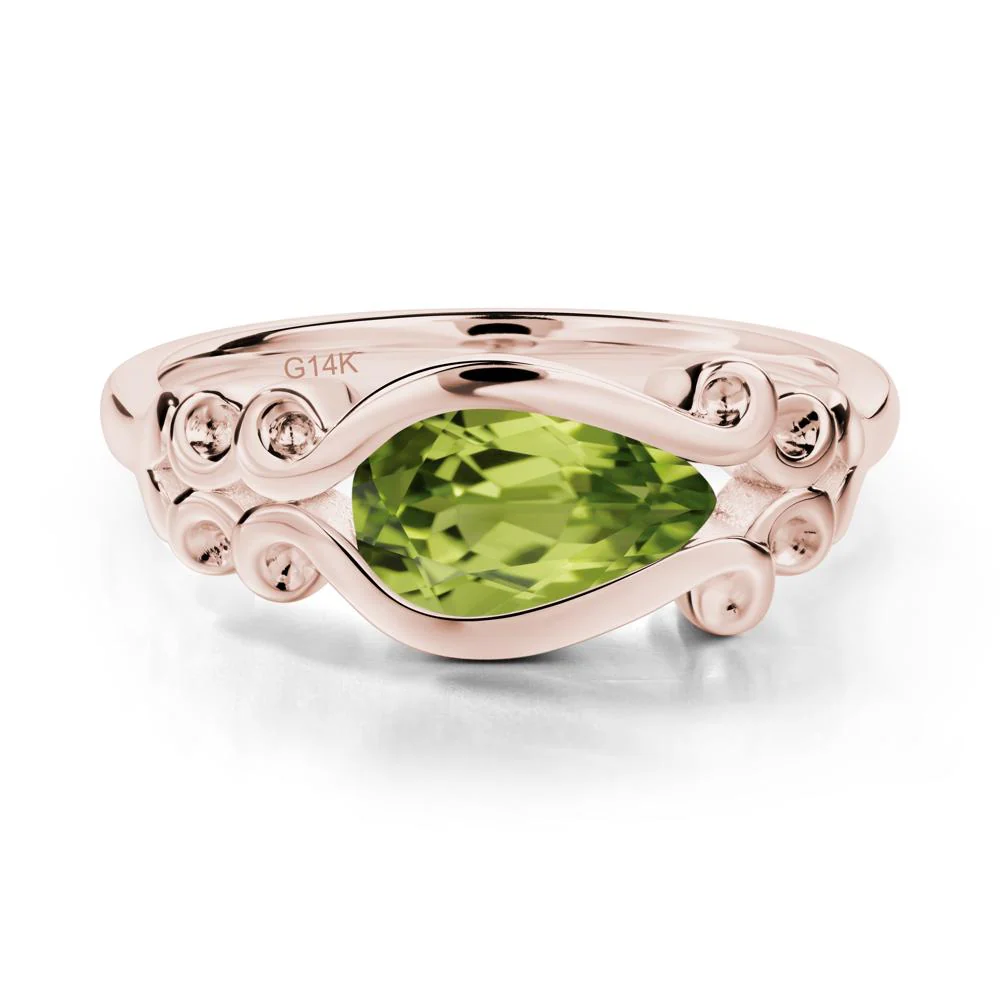 Pear Shaped Peridot Scroll Ring - Image 2