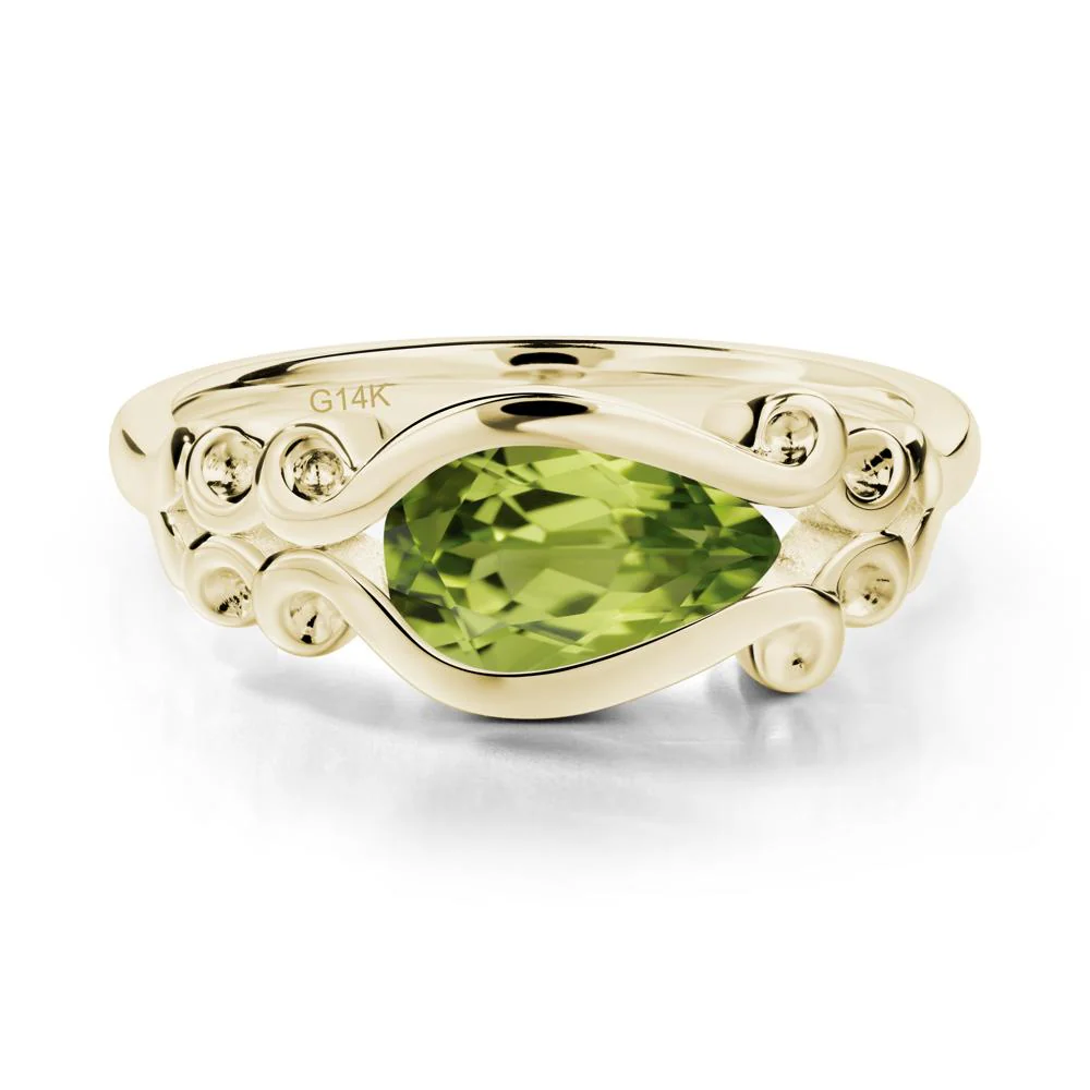 Pear Shaped Peridot Scroll Ring - Image 7