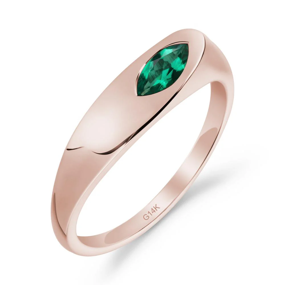 Simple Marquise Emerald Solitaire Ring