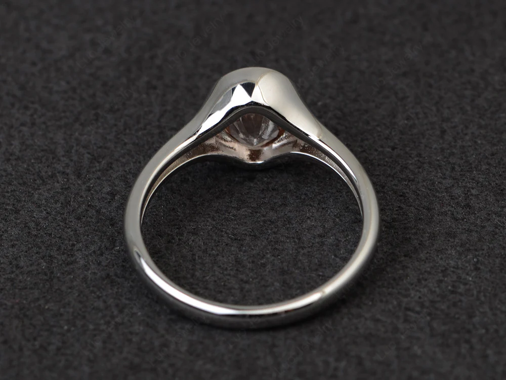 Simple Oval Bezel Set Morganite Ring - Image 3