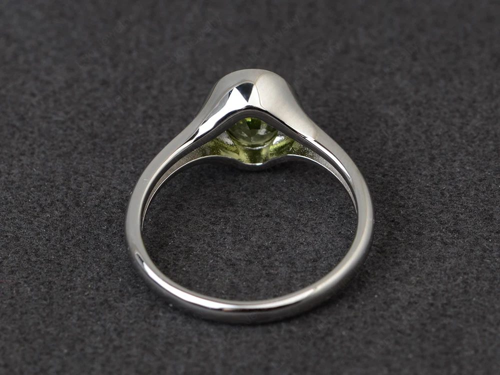 Simple Oval Bezel Set Peridot Ring - Image 3