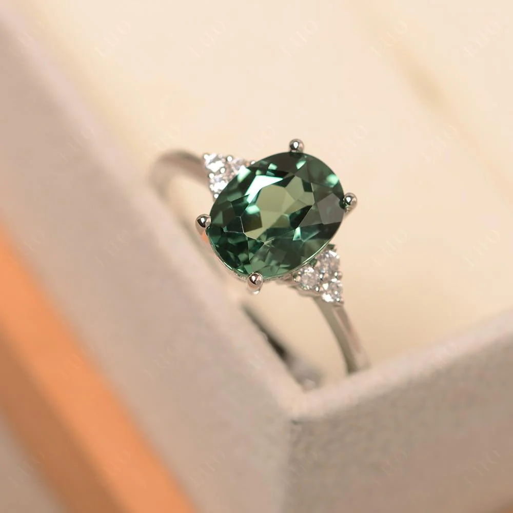 Simple Oval Green Sapphire Ring - Image 12