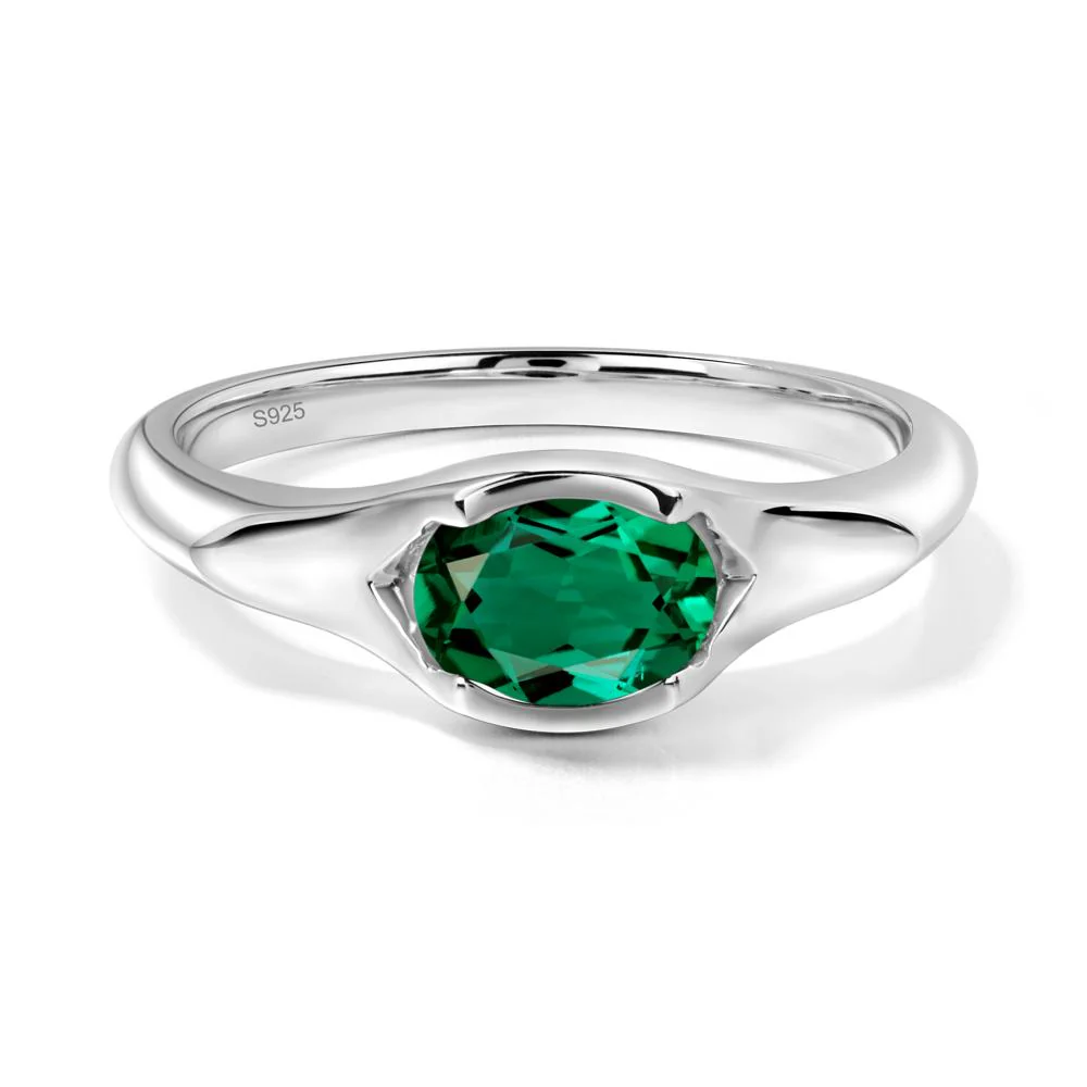 Oval Emerald East West Bezel Set Ring - Image 6