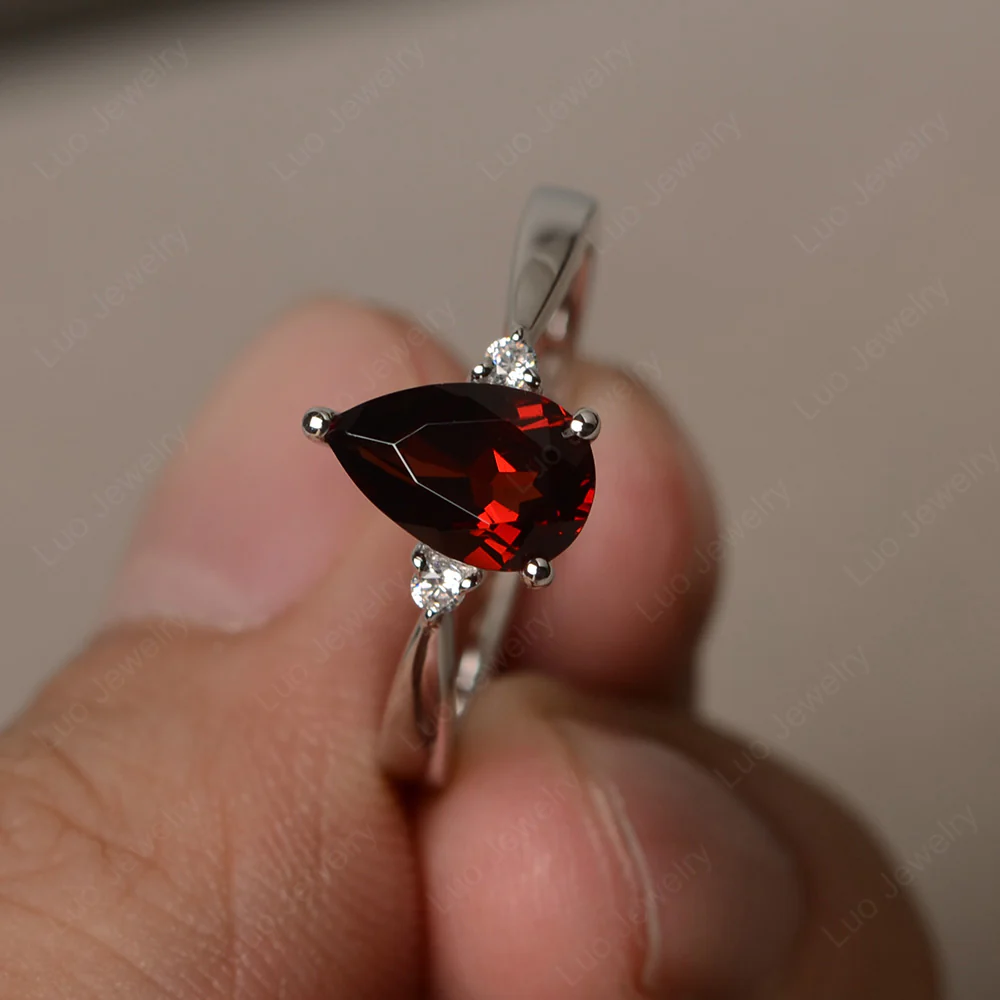 Pear Shaped Garnet Trilogy Ring
