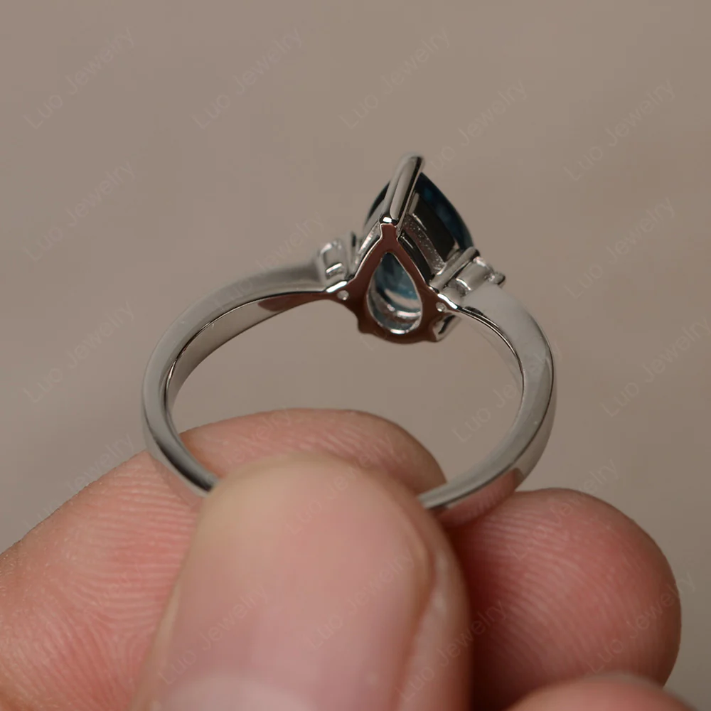Pear Shaped London Blue Topaz Trilogy Ring - Image 3