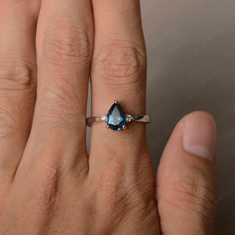 Pear Shaped London Blue Topaz Trilogy Ring - Image 4