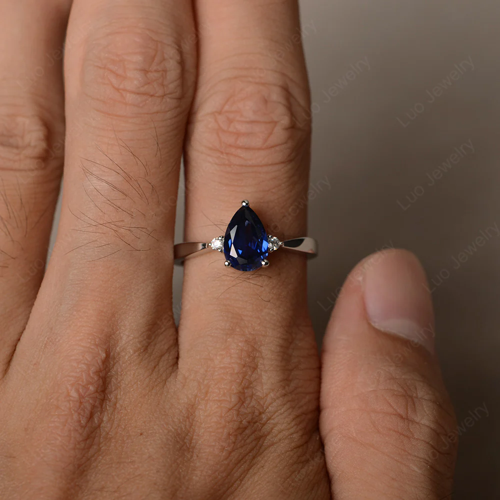 Pear Shaped Sapphire Trilogy Ring - Image 4