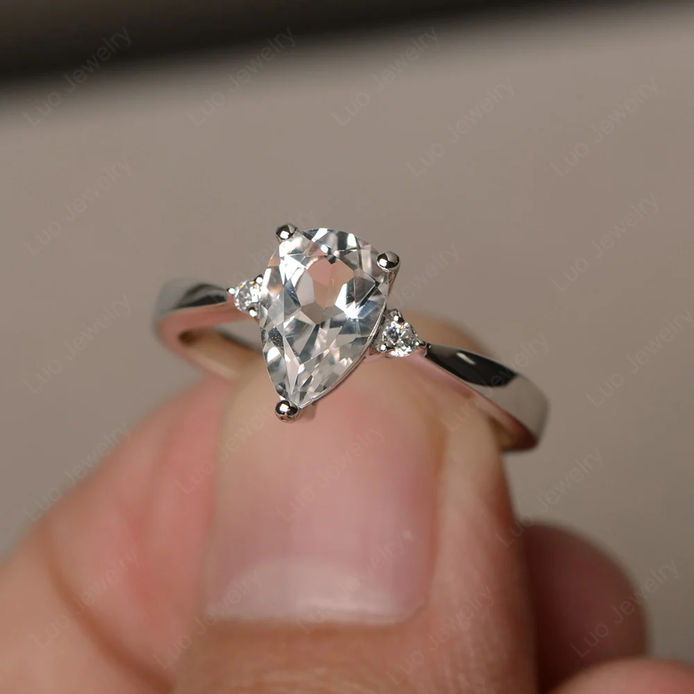 Pear Shaped White Topaz Trilogy Ring - Image 2
