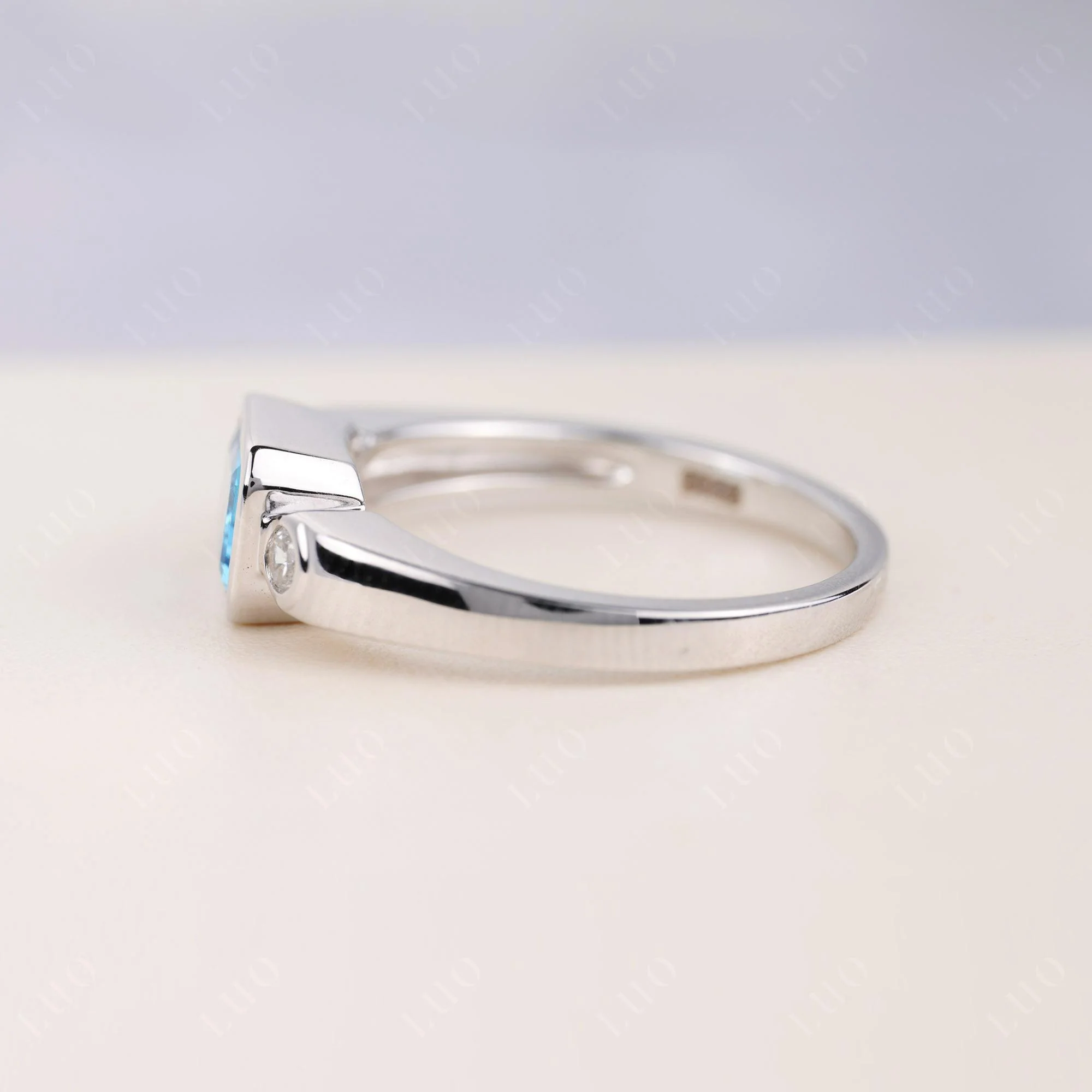 Swiss Blue Topaz Bezel Emerald Cut Ring - Image 3
