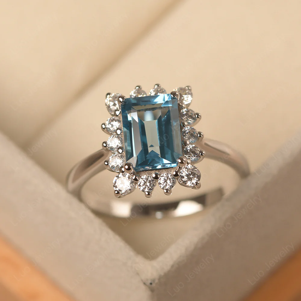 Emerald Cut Swiss Blue Topaz Halo Luxury Ring