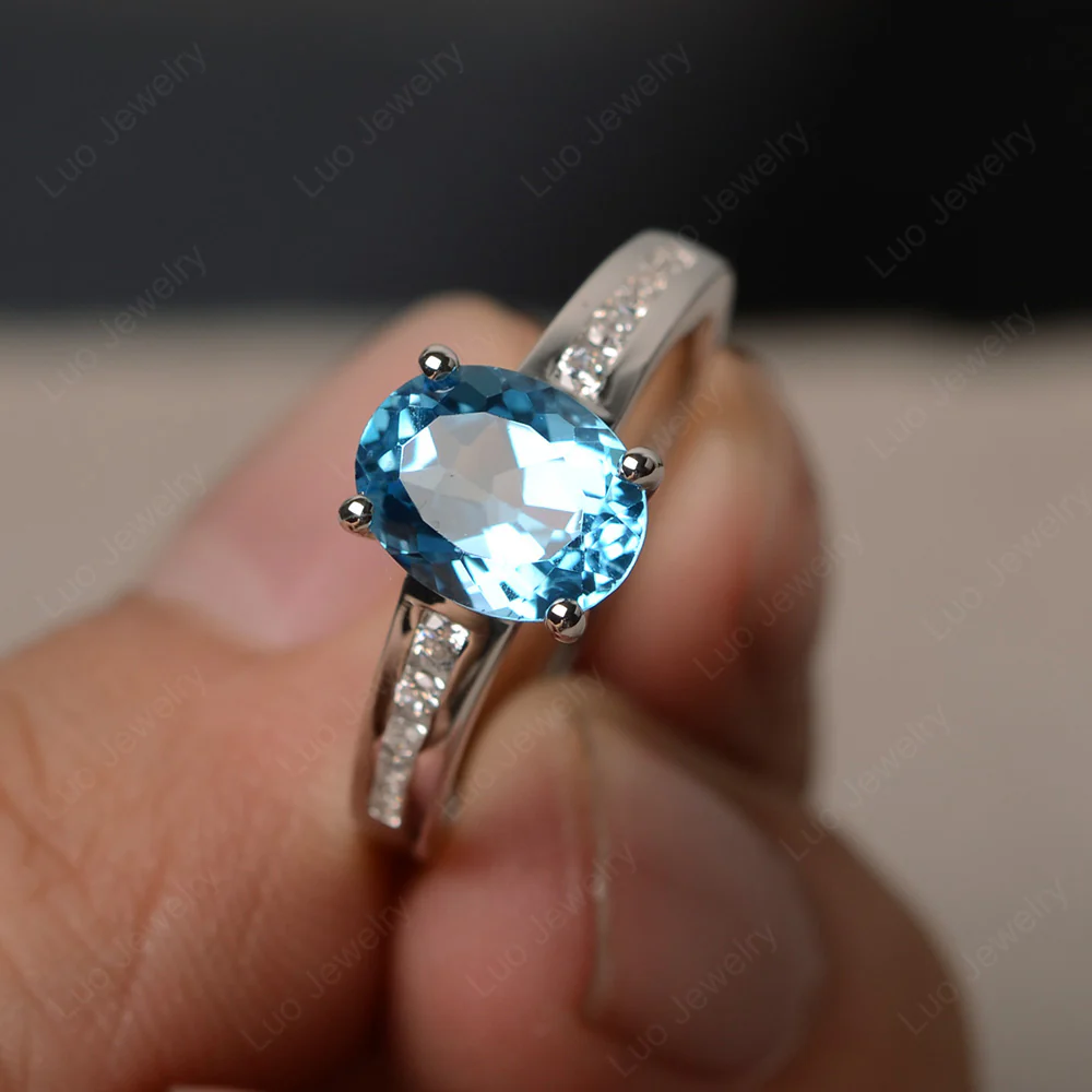 Classic Oval Swiss Blue Topaz Engagement Ring