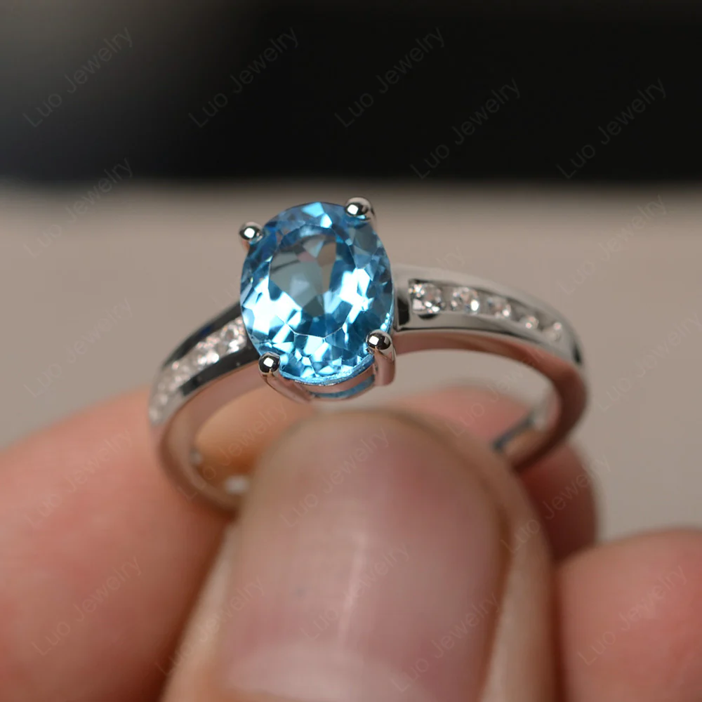 Classic Oval Swiss Blue Topaz Engagement Ring - Image 2