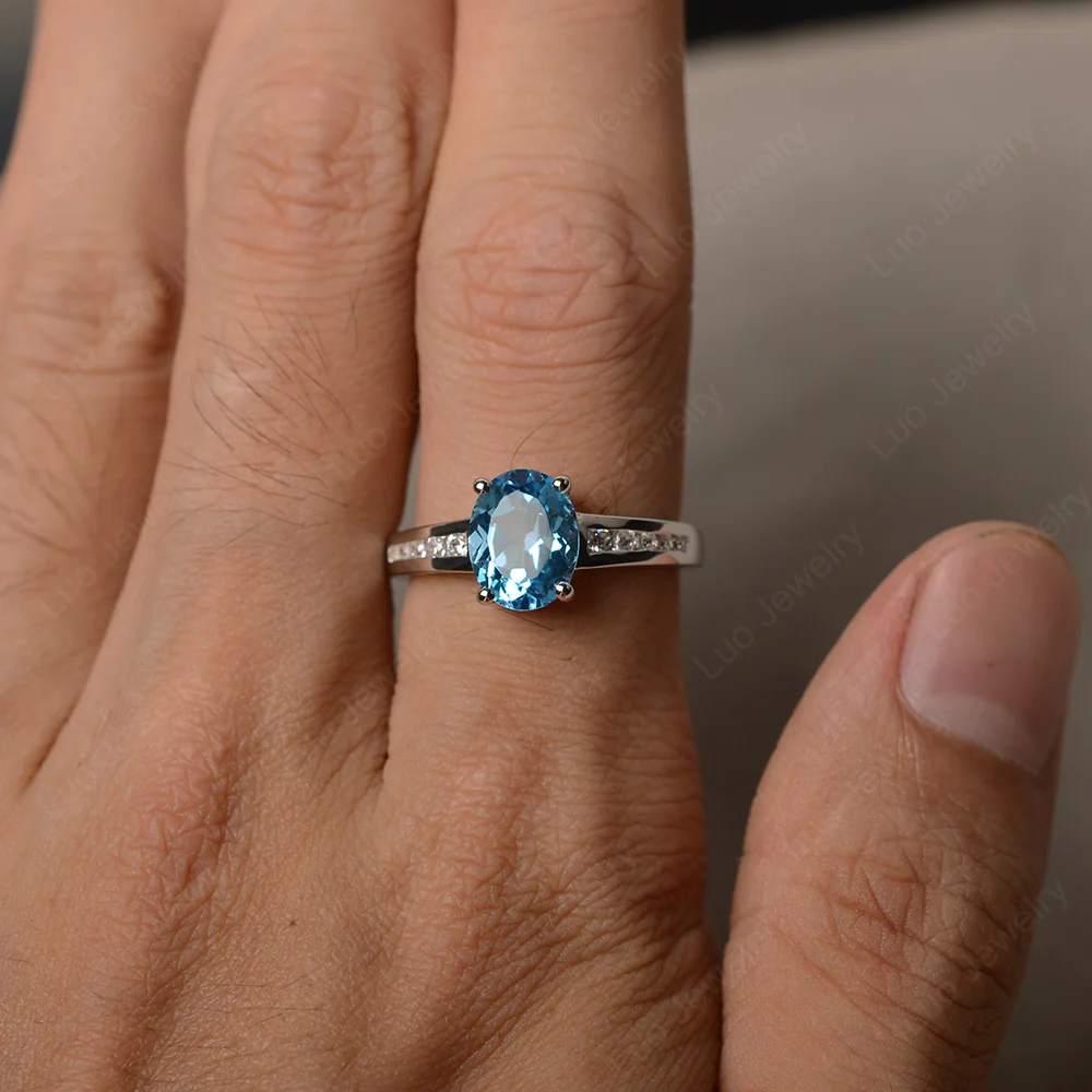 Classic Oval Swiss Blue Topaz Engagement Ring - Image 4