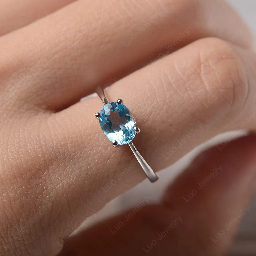 Swiss Blue Topaz Oval Solitaire Engagement Ring - Image 5