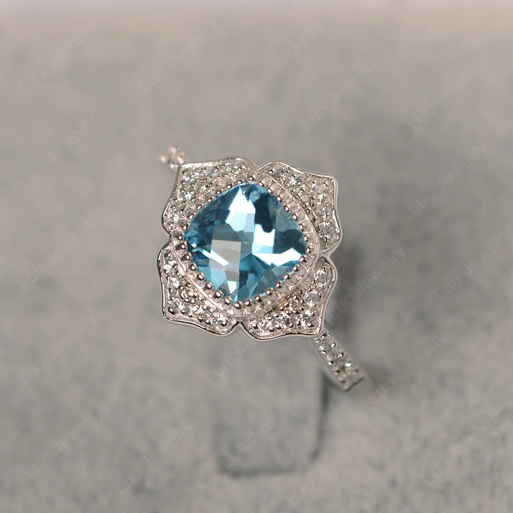 Swiss Blue Topaz Lotus Halo Engagement Ring