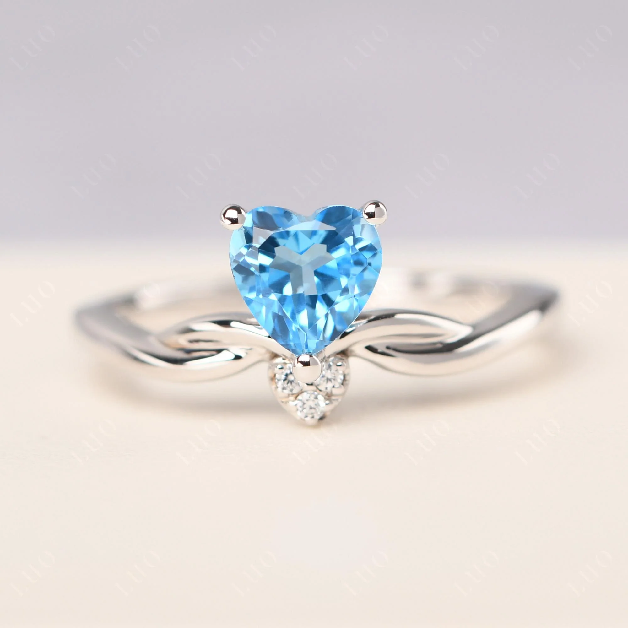 Swiss Blue Topaz Twisted Heart Ring - Image 10