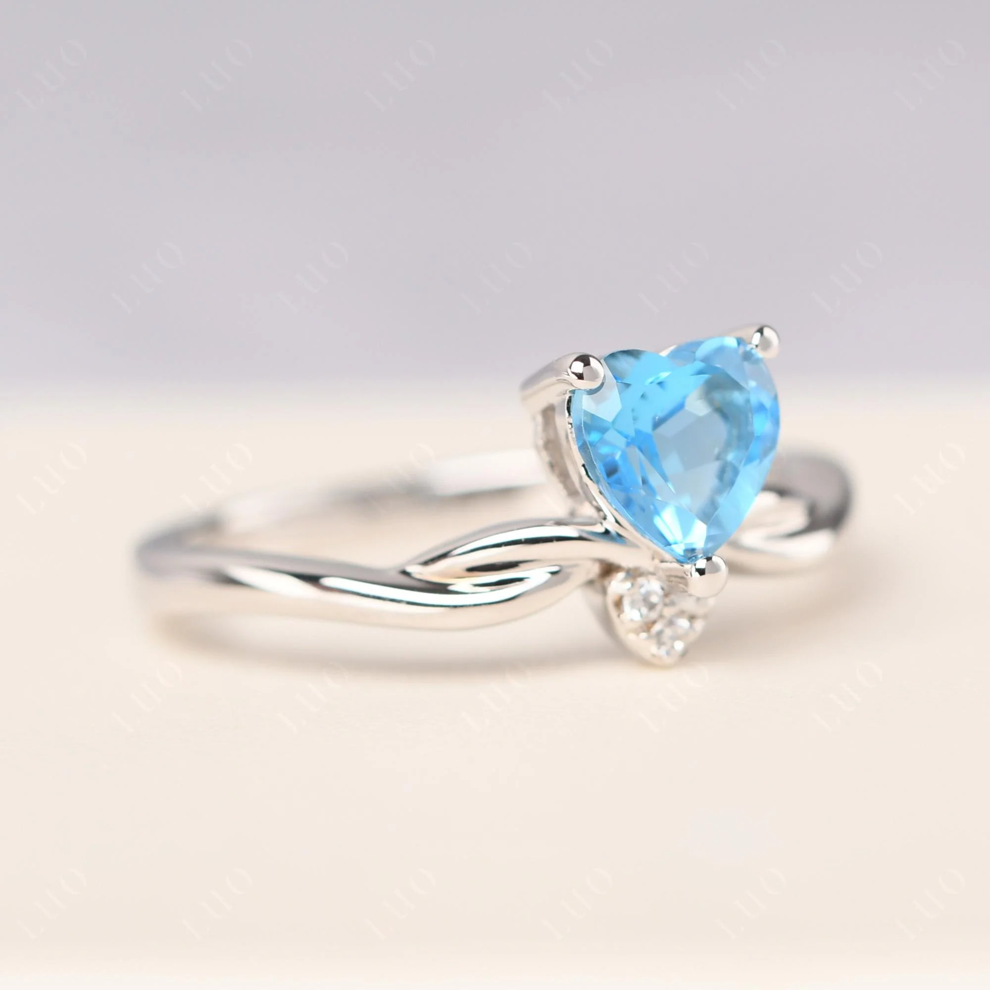 Swiss Blue Topaz Twisted Heart Ring - Image 11
