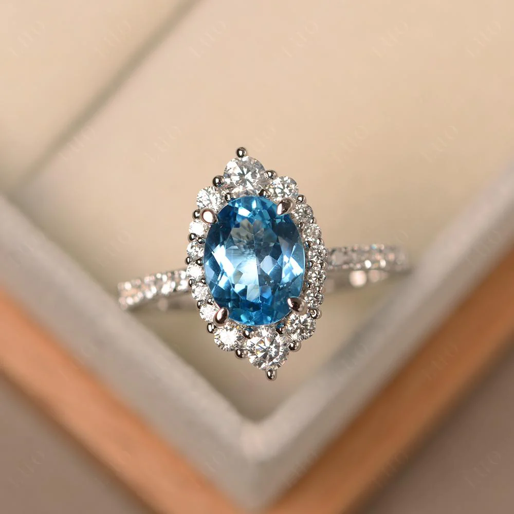 Oval Swiss Blue Topaz Halo Cluster Ring - Image 10