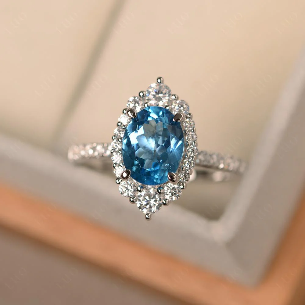 Oval Swiss Blue Topaz Halo Cluster Ring - Image 11