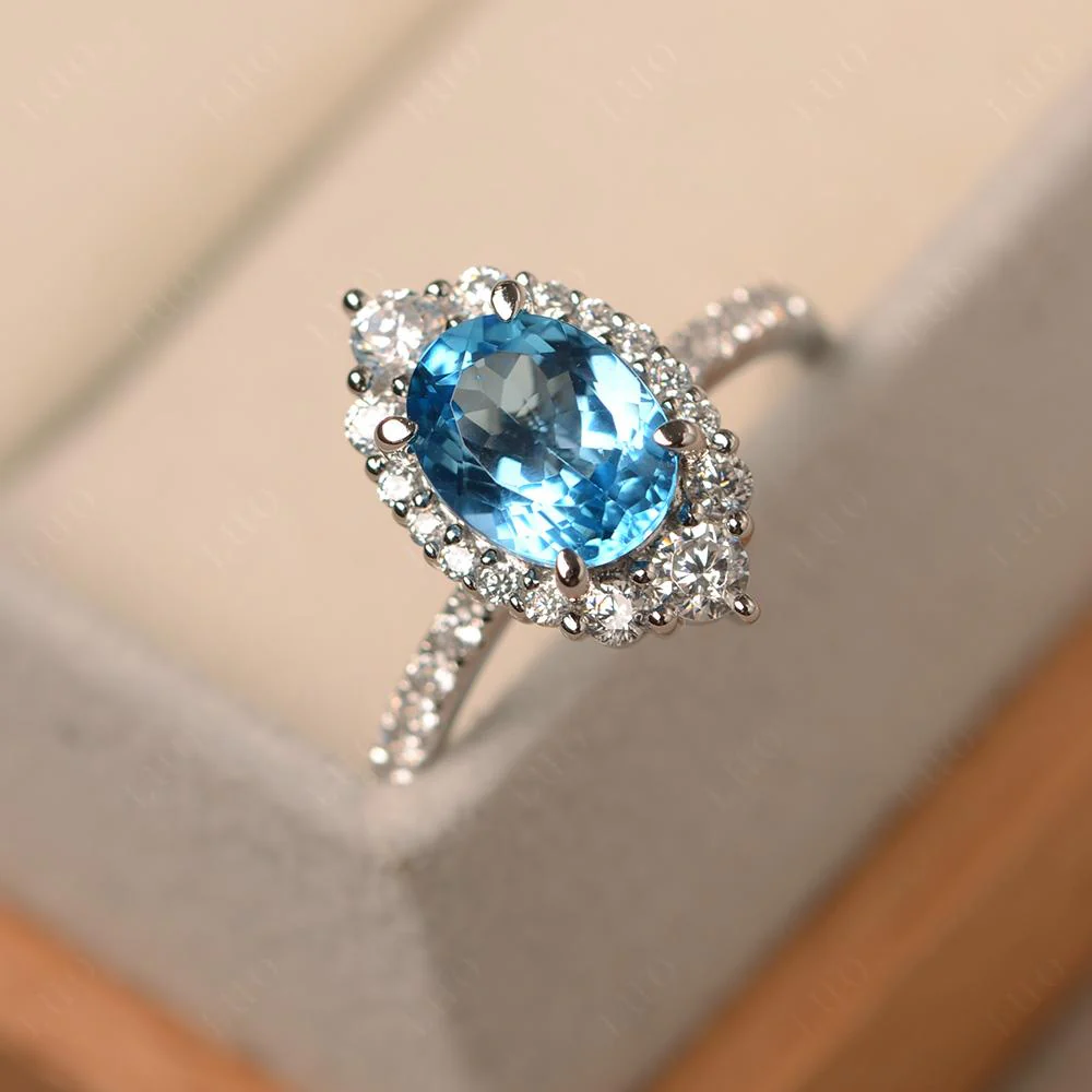 Oval Swiss Blue Topaz Halo Cluster Ring - Image 12