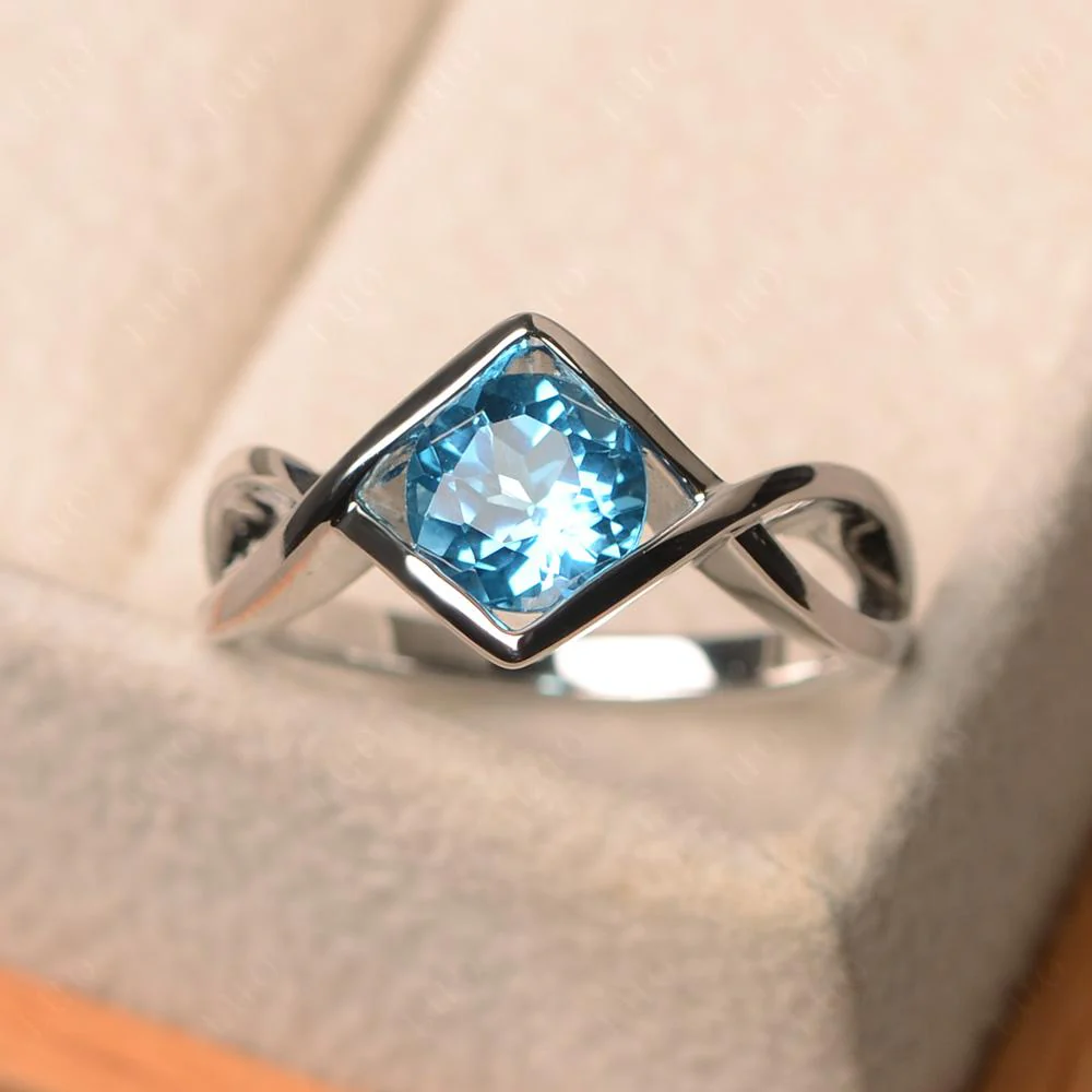 Swiss Blue Topaz Bezel Set Infinity Solitaire Ring - Image 10