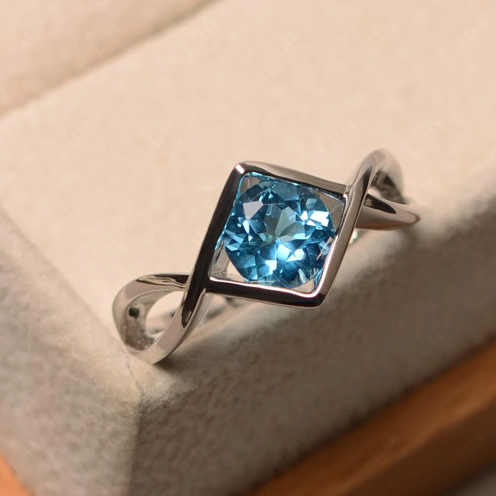 Swiss Blue Topaz Bezel Set Infinity Solitaire Ring - Image 11