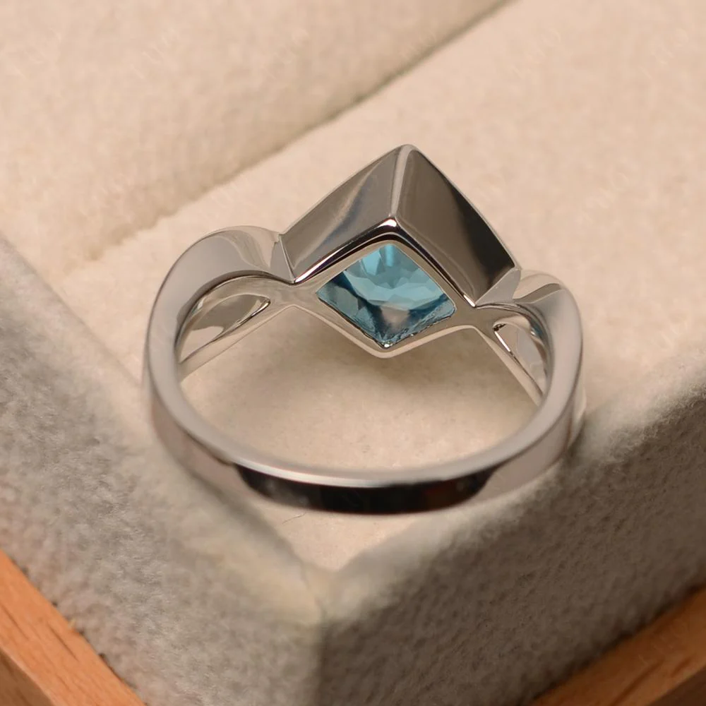 Swiss Blue Topaz Bezel Set Infinity Solitaire Ring - Image 12