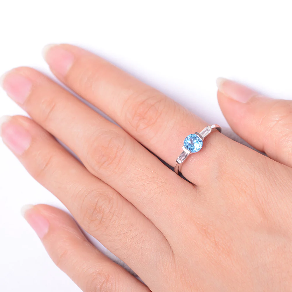 Swiss Blue Topaz Ring Round Cut with Baguette Side - Image 4