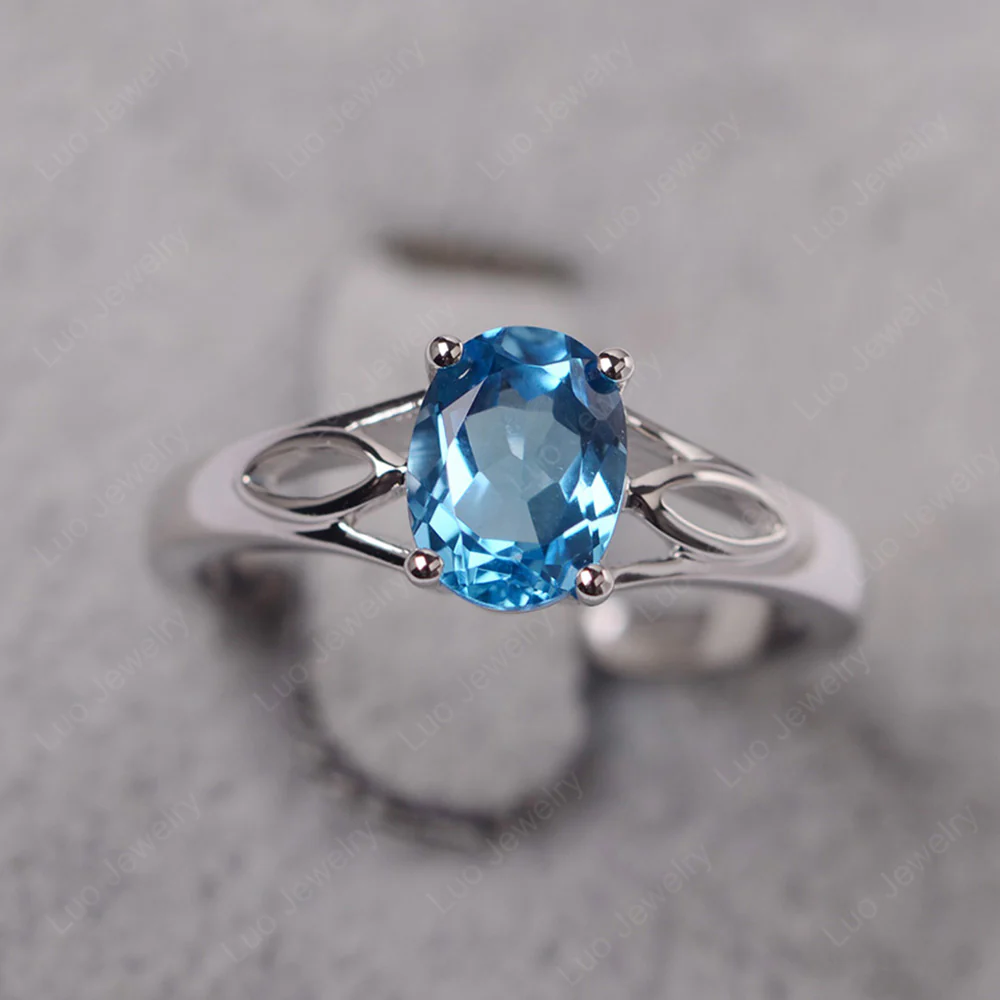 Oval Swiss Blue Topaz Solitaire Split Shank Ring
