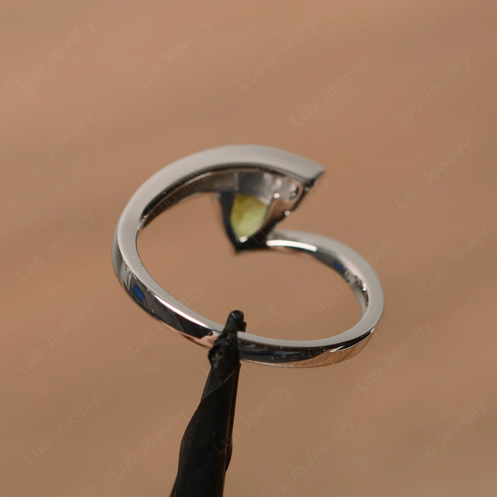Trillion Cut Peridot Bypass Engagement Ring - Image 3
