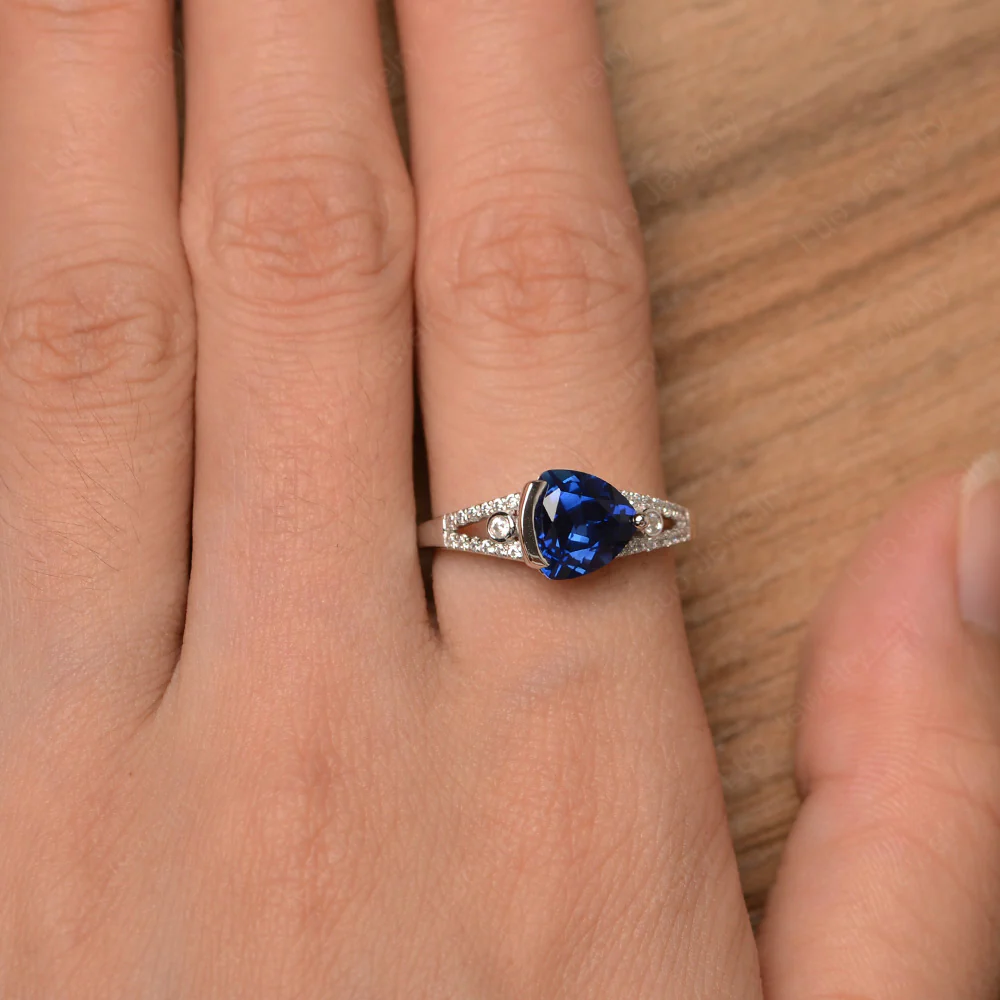 Trillion Cut Sapphire Horizontal Ring - Image 4