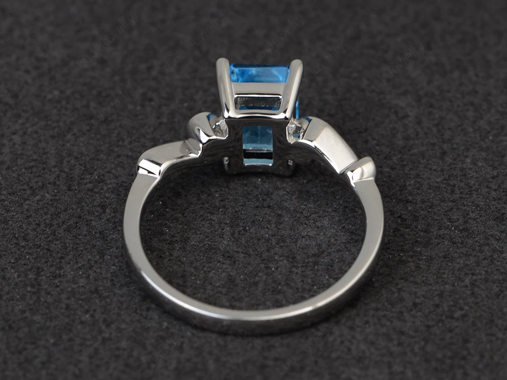 Emerald Cut Swiss Blue Topaz Tilde Ring - Image 3