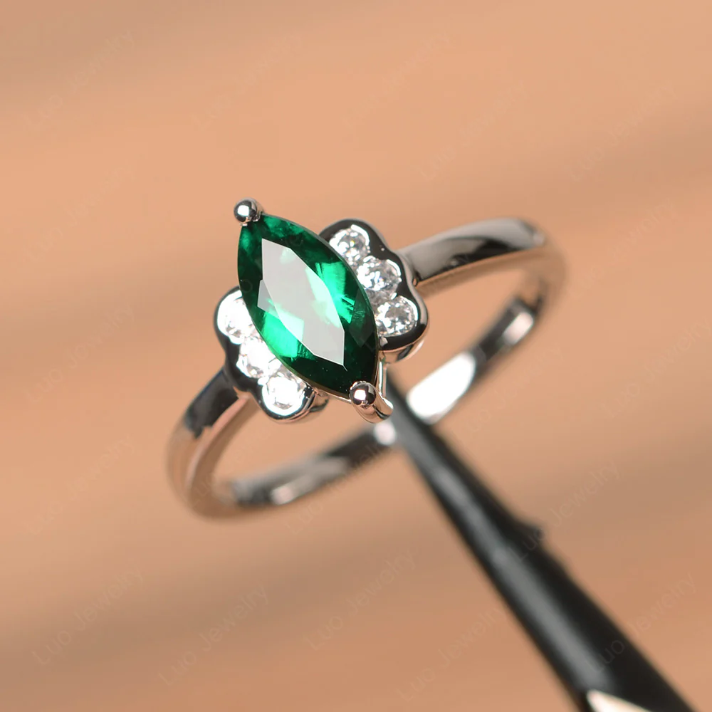 Unique Emerald Marquise Cut Ring