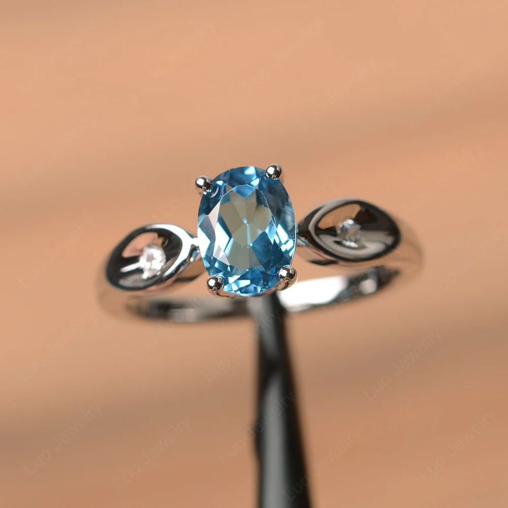 Unique Oval Cut Swiss Blue Topaz Ring