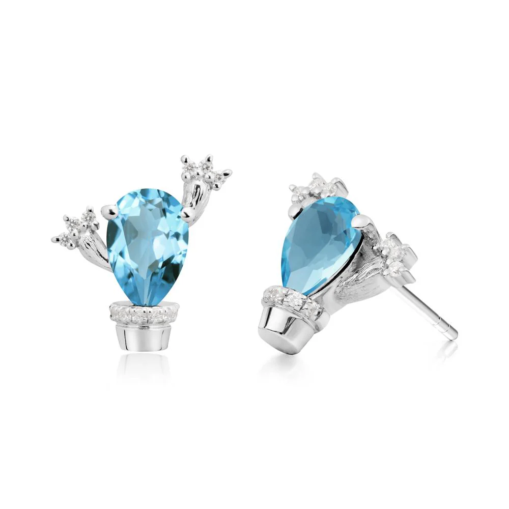 Unique Swiss Blue Topaz Stud Earrings - Image 8