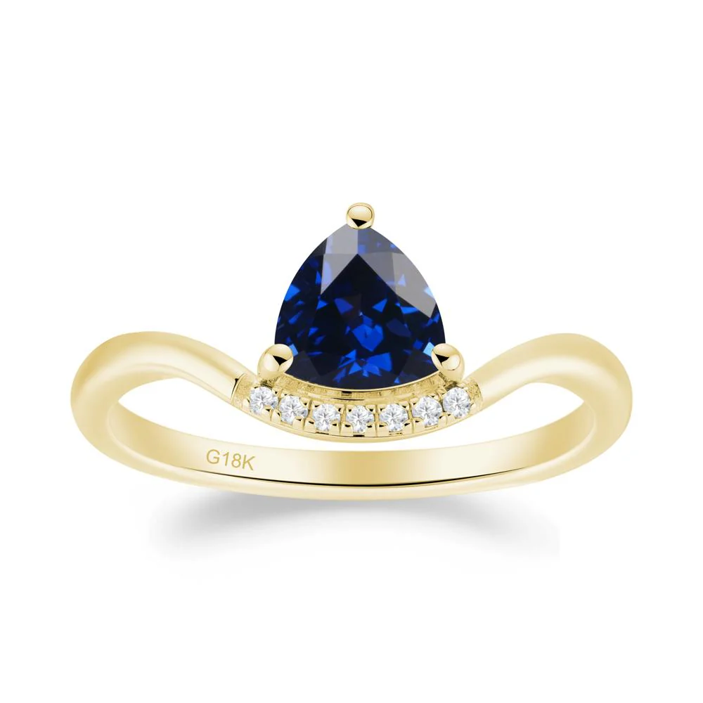 Unique Trilliant Cut Sapphire Ring - Image 9