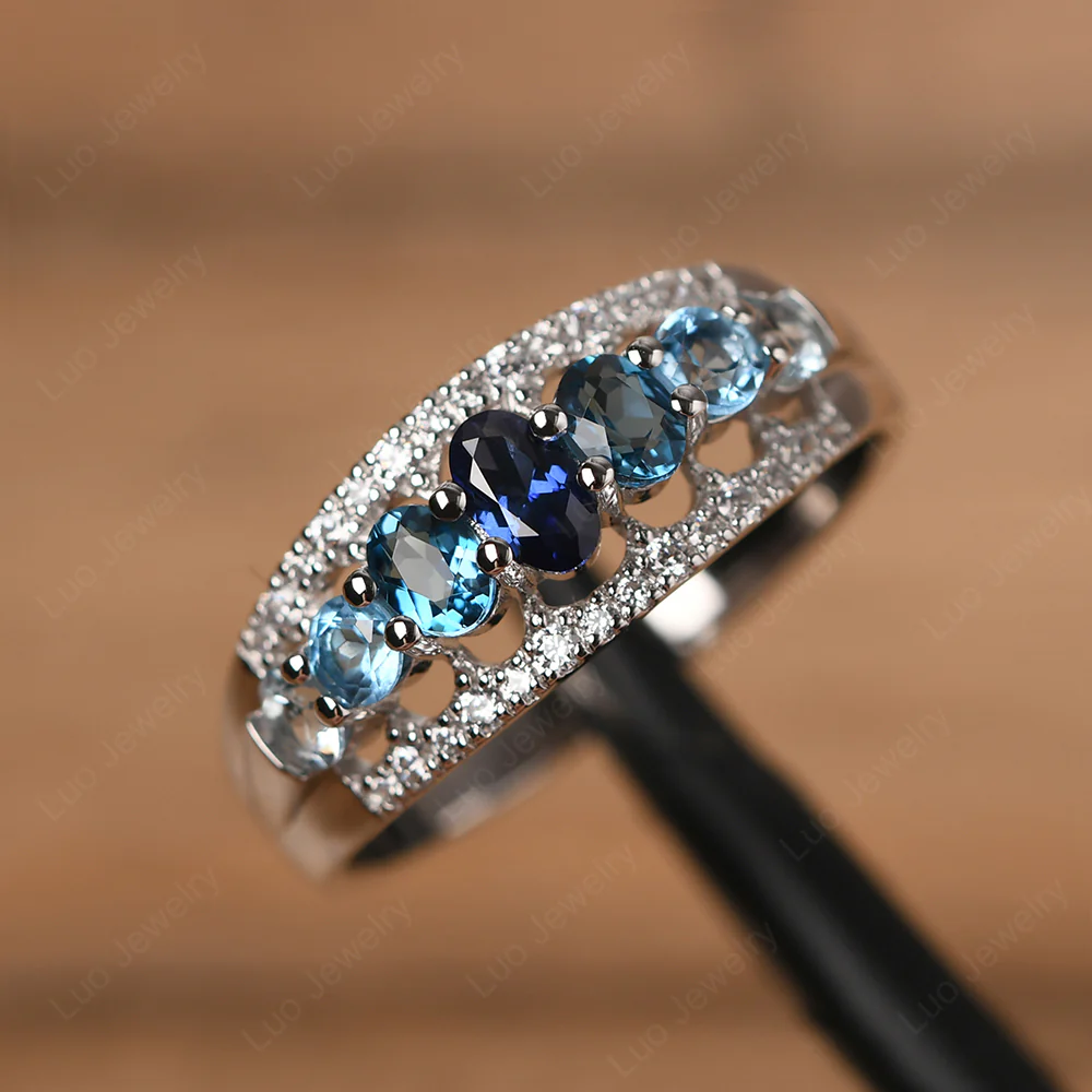 Sapphire and Aquamarine and Topaz Ring