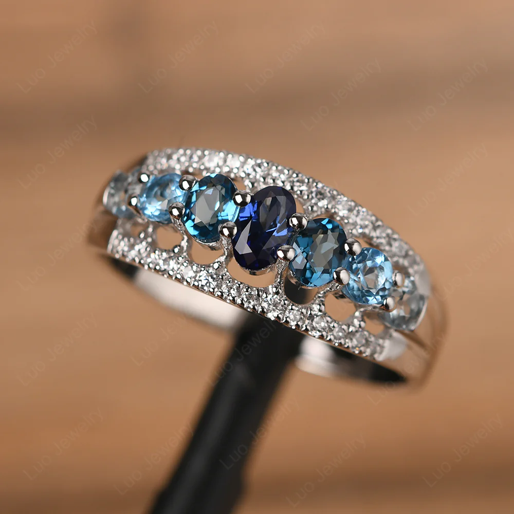 Sapphire and Aquamarine and Topaz Ring - Image 2